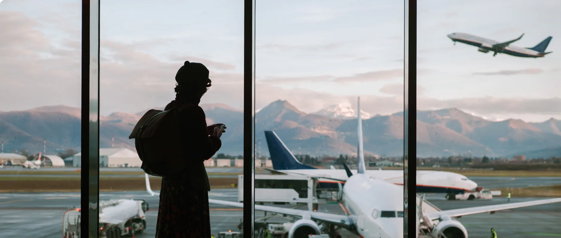 Traveler watching planes at the airport